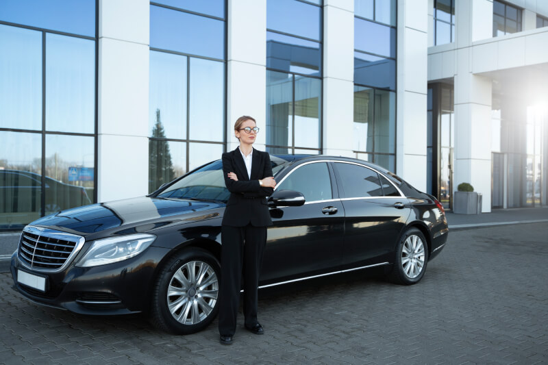 Luxurious Vehicle In Front Of A Conference Center Photo